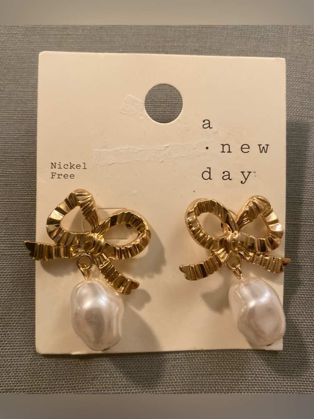 a new day Gold Ribbon Earrings with Pearl Drops